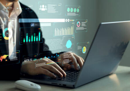 Businessman using KPI dashboard.Management data System KPI connected in database for follow earnings,operations and sales data.Financial business data analytics graph dashboard
